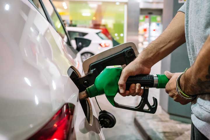 Man filling up car with petrol