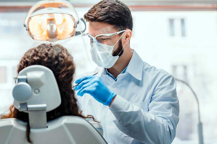 Dentist performing an examination