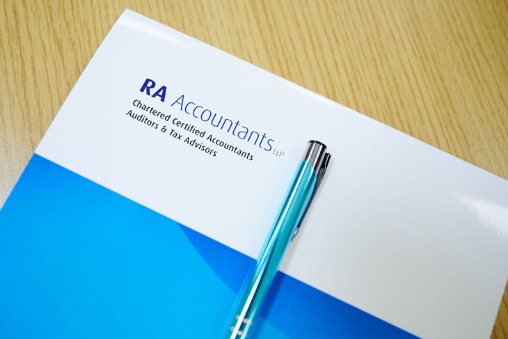 RA Accountants pen and notepad